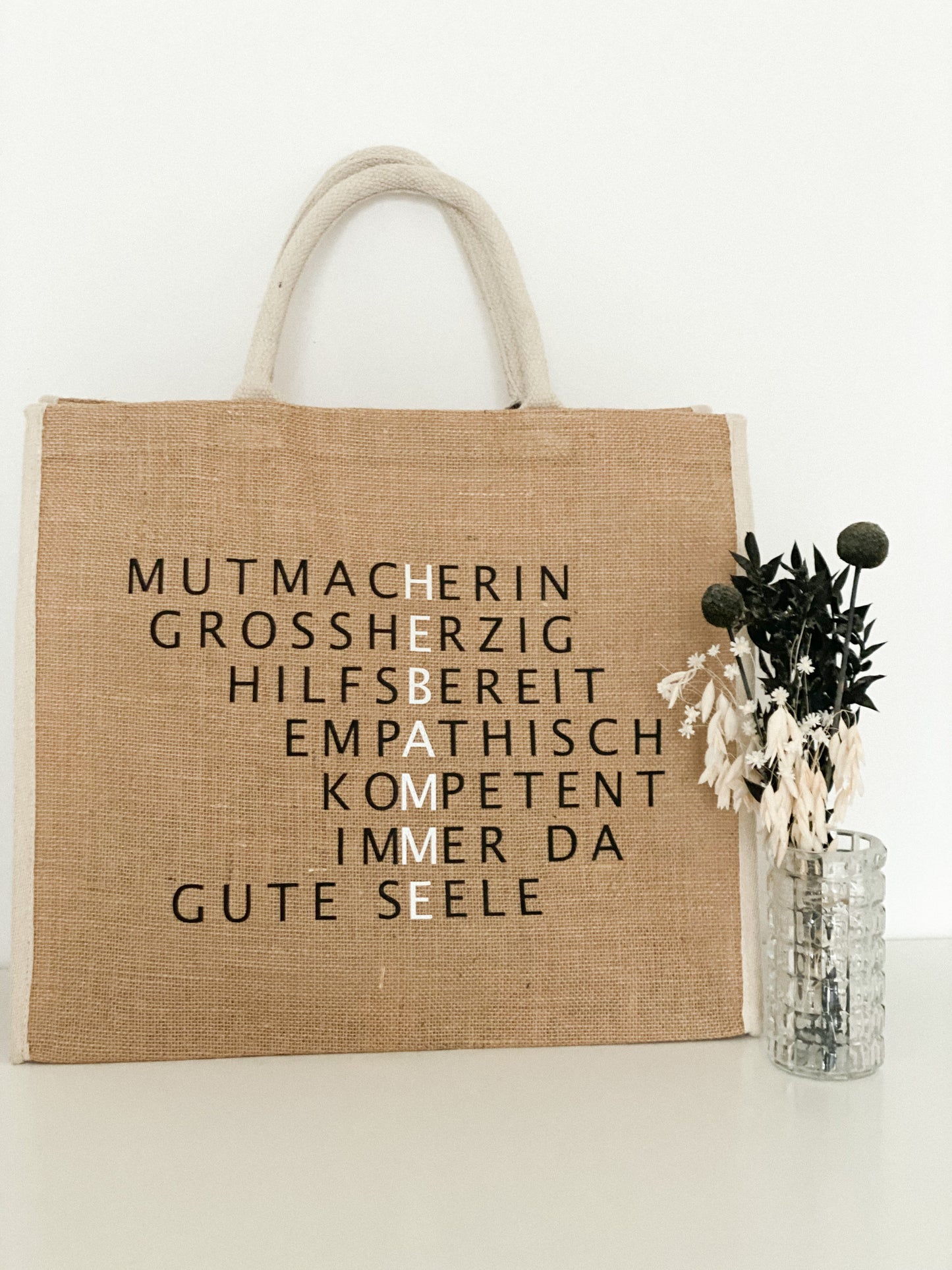 Jutetasche mit schwarzen oder beigen Rand